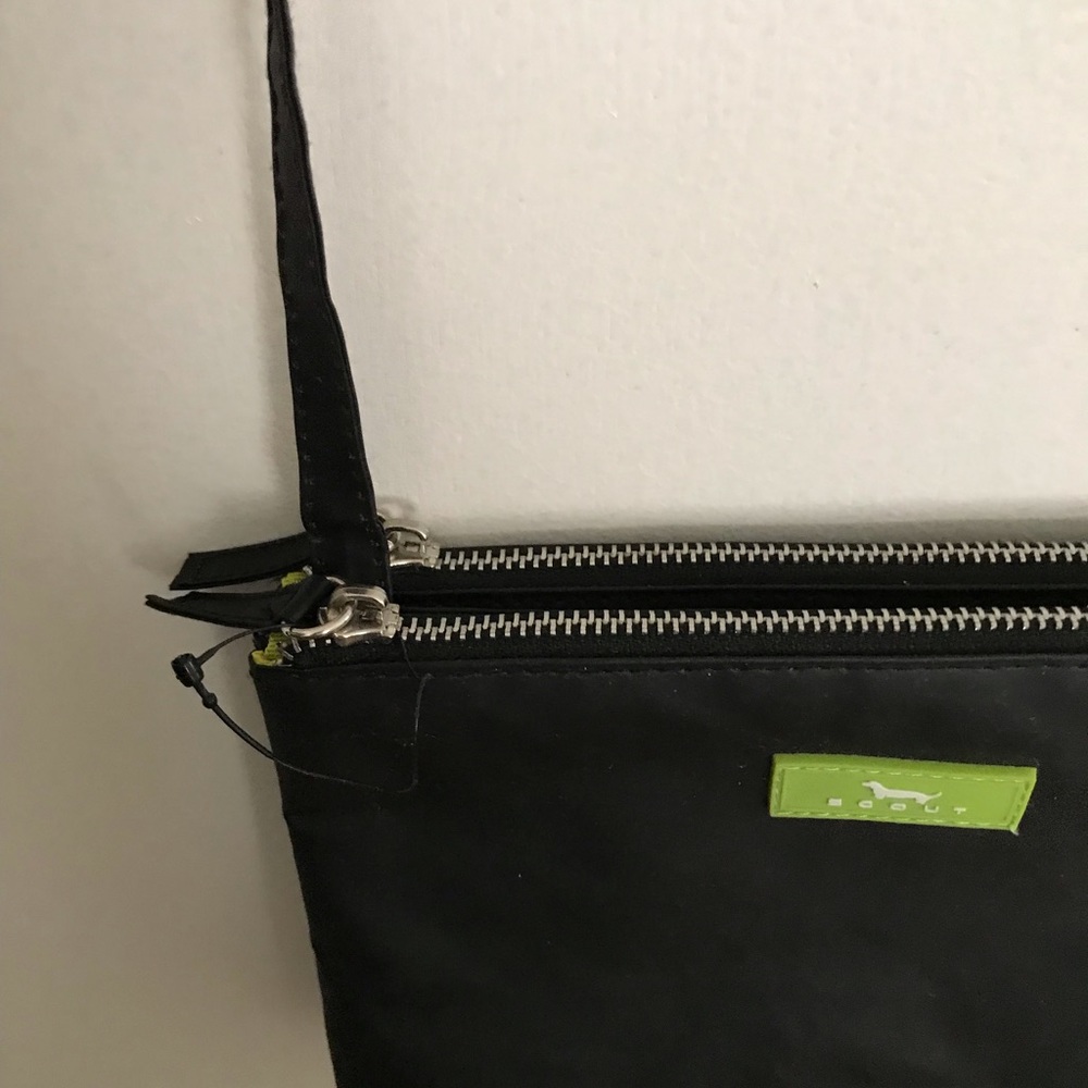 Scout small crossbody bag.  Very pretty lining.  Never used.